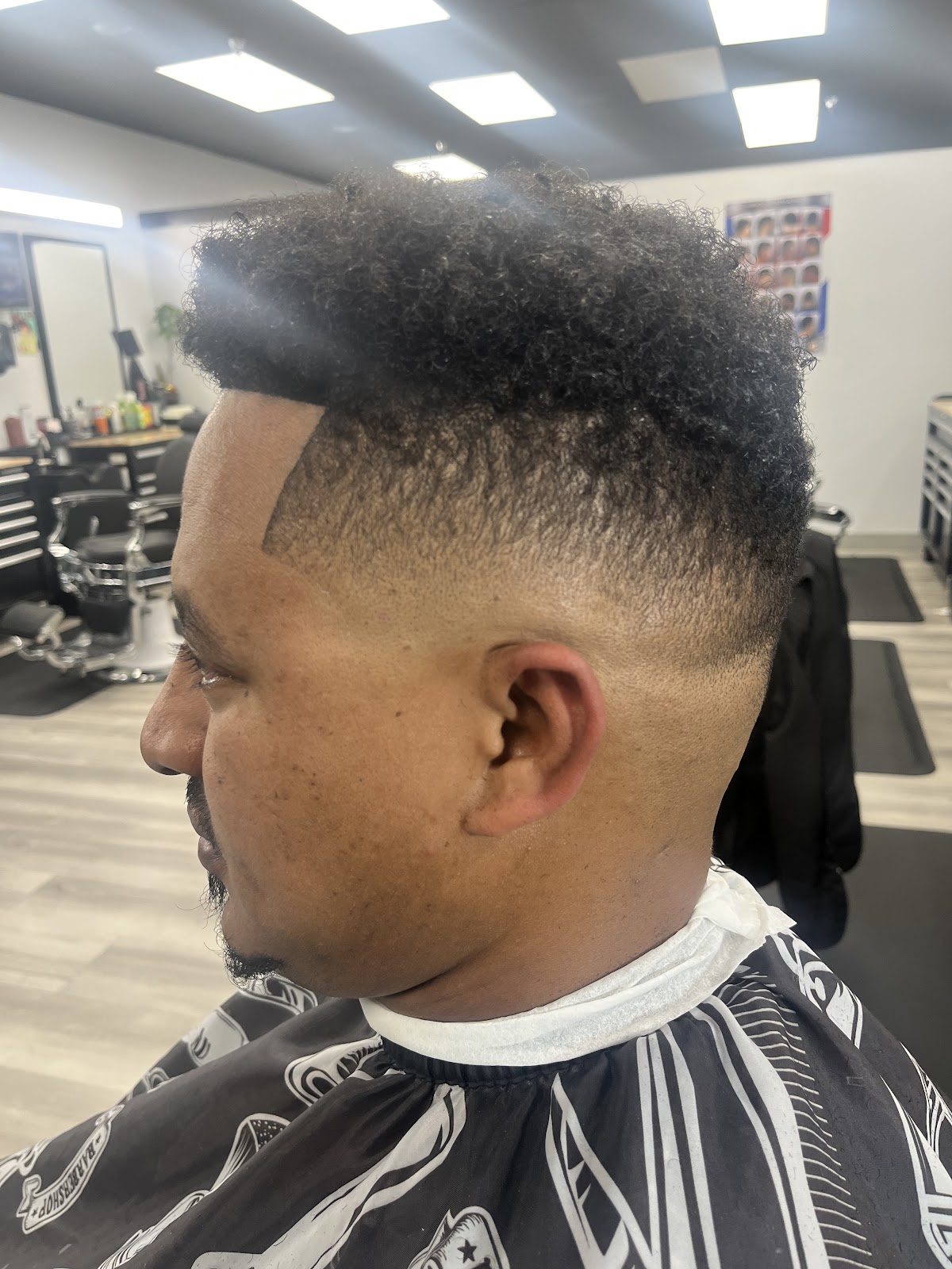 Sharp curly top fade haircut finished result in shop